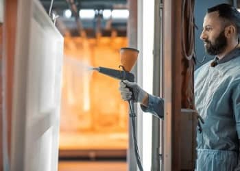 Powder-coated cladding spraying