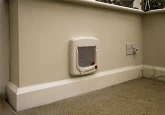 Wall cat flap installation