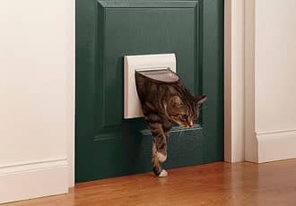 Wooden door cat flap installation